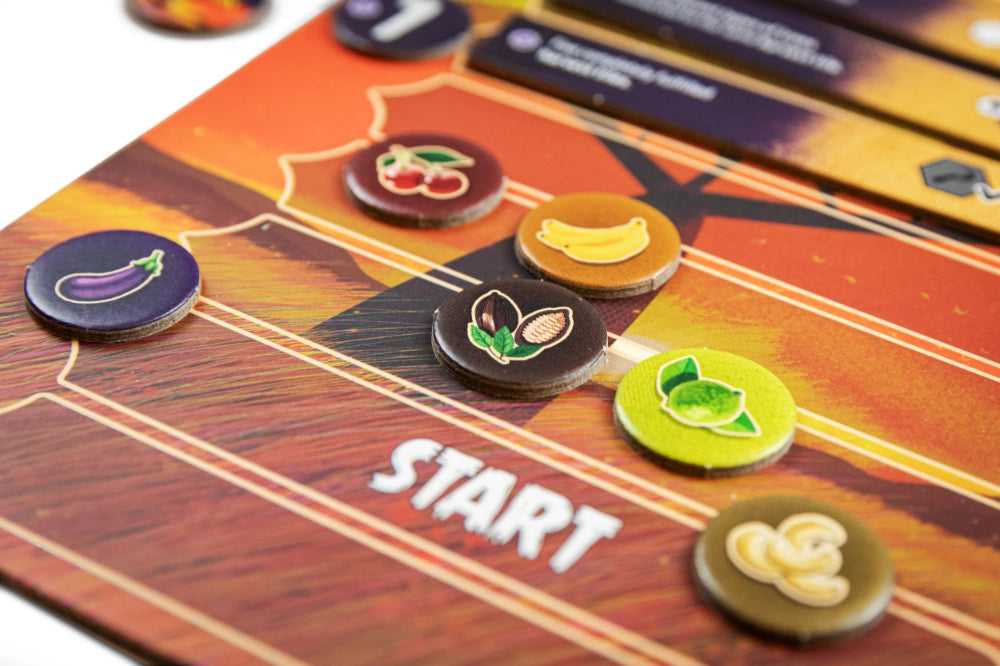 Spielsteine und Früchte-Token des Brettspiels Click a tree von Skellig Games