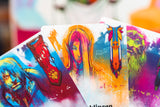 Bunte Spielkarten von GROLL Frosted Games mit Fantasy-Illustration und Farbverlauf