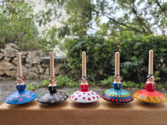 Aeikinition | Kreisel | „Puppe" / "Doll"