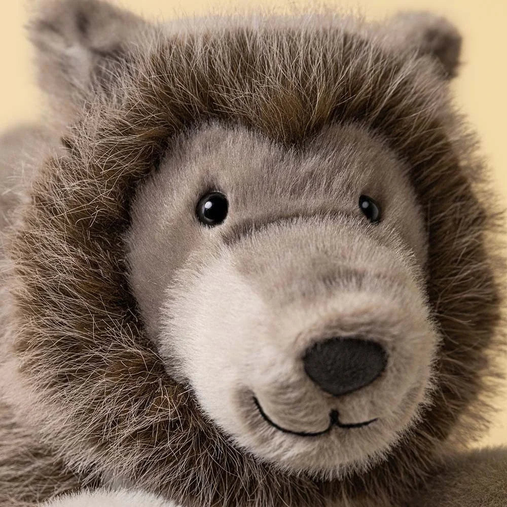 Jellycat Ulrich Wolf Plüschtier grau weiß lächelnd Nahaufnahme