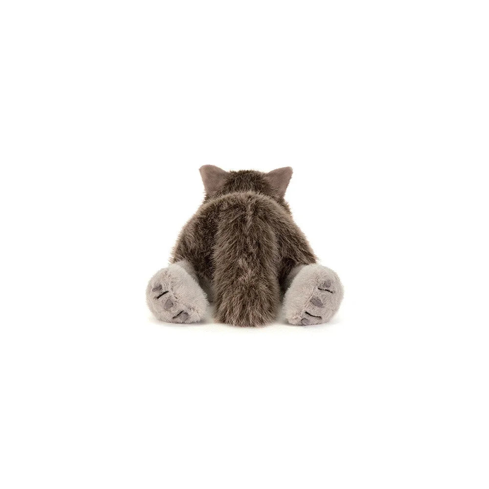 Grauer Jellycat Ulrich Wolf sitzt von hinten mit weißen Pfoten