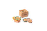 Grapat Dishes Holzteller Set mit farbigen Ringen und Verpackung
