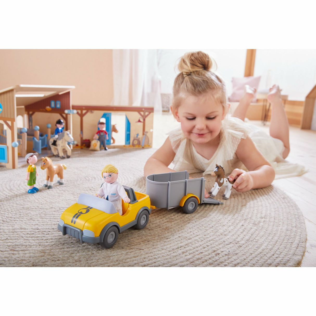 HABA | Little Friends – Tierarzt-Auto mit Anhänger